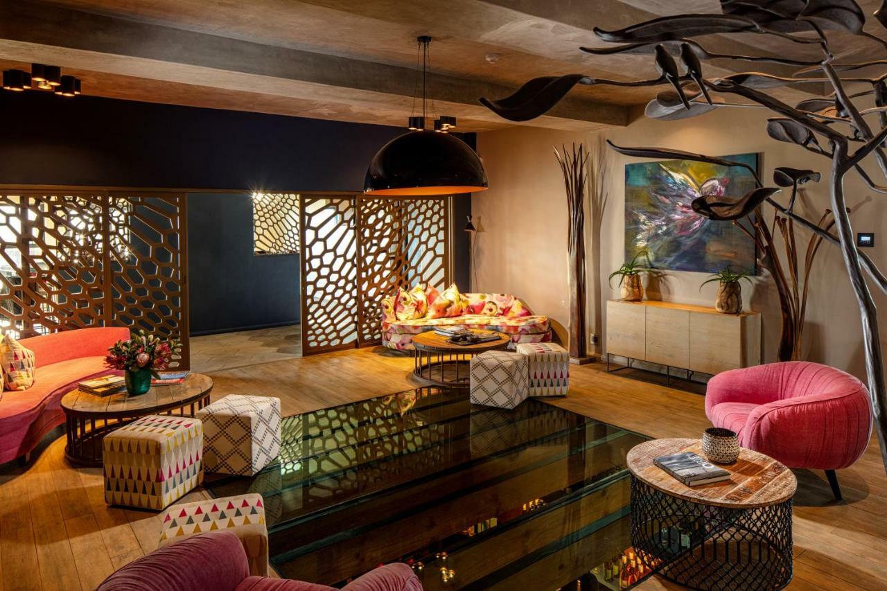 Sky Villa Boutique Hotel By Raw Africa Collection Plettenbergbaai Buitenkant foto The interior of the restaurant
